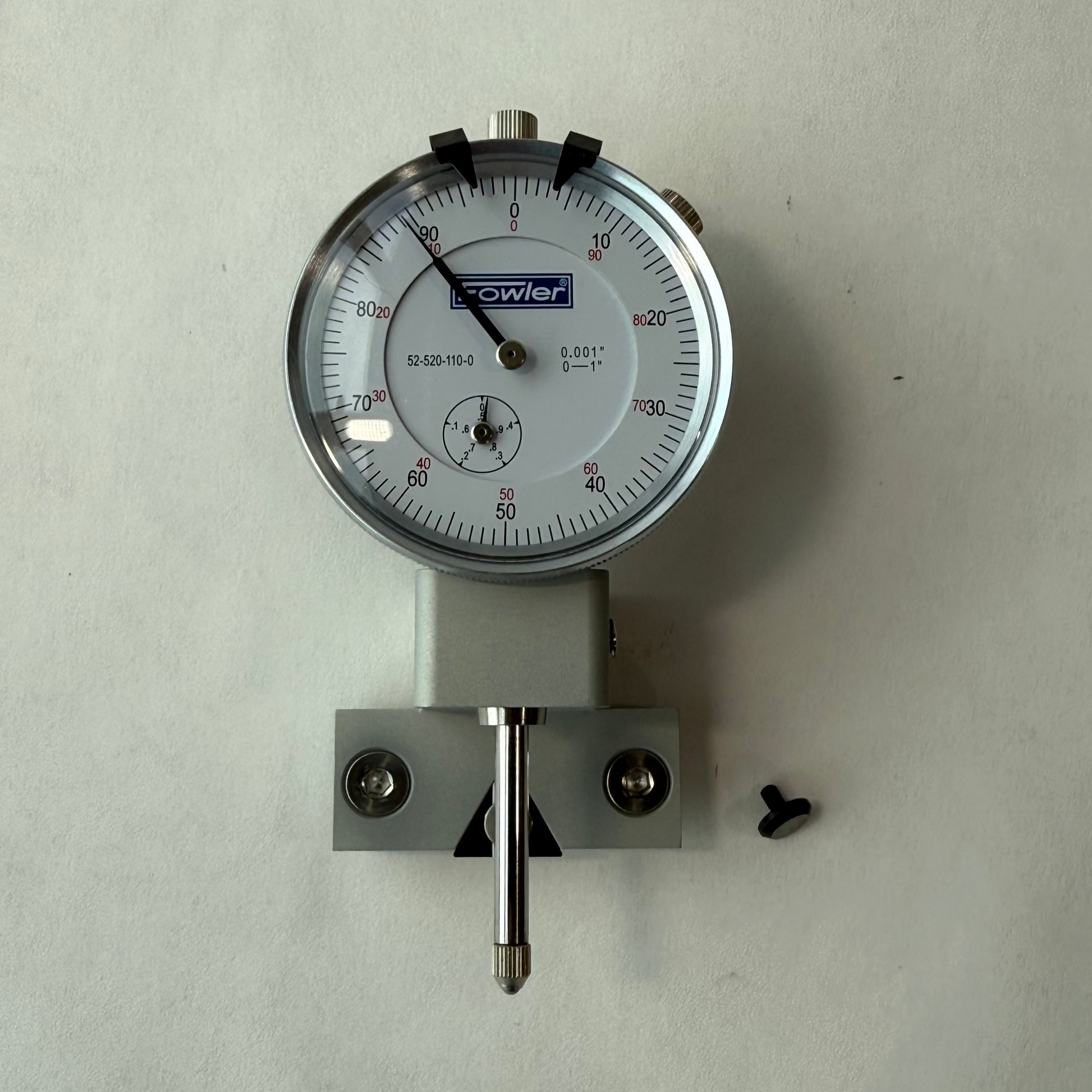 Dial indicator gauge on a white background